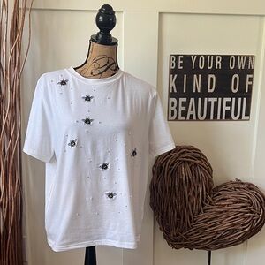 On Twelfth Elegant White Bee Embroidered Women's Tee.